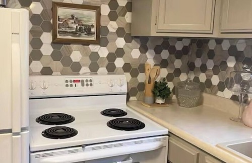 Gaylord Cottage | Experience Pink Door Cottage: Lake View & Pool Retreat