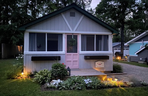 Gaylord Cottage | Experience Pink Door Cottage: Lake View & Pool Retreat