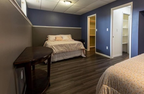 Grande Prairie House | Enchanting Pink Door Hotel - Perfect for Families