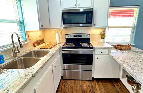Surfside Beach House | Relax at Pink Flamingo: Pet-Friendly Retreat with Spa & Breakfast