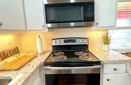 Surfside Beach House | Relax at Pink Flamingo: Pet-Friendly Retreat with Spa & Breakfast