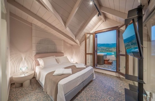 Kefalonia Hotel | Discover the Pink Panther Maisonette Suite with Spa Access