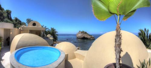 Amapas Apartment | Experience Pinnacle Resorts 180: Beachfront Bliss & Spa
