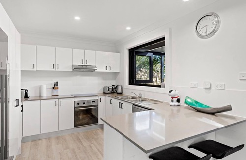 Culburra Beach House | Pipers Spot: Pet Friendly Retreat with Pool and Ocean Views
