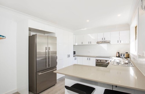Culburra Beach House | Pipers Spot: Pet Friendly Retreat with Pool and Ocean Views