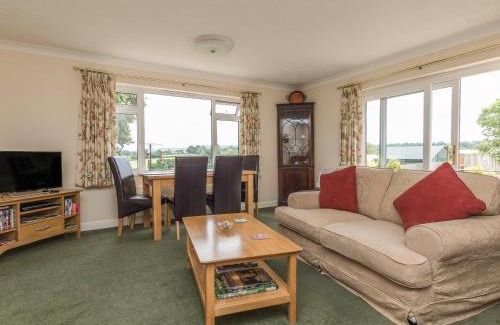 Plymtree House | Explore Pipistrelle Lodge: A Cozy 4-Star Retreat