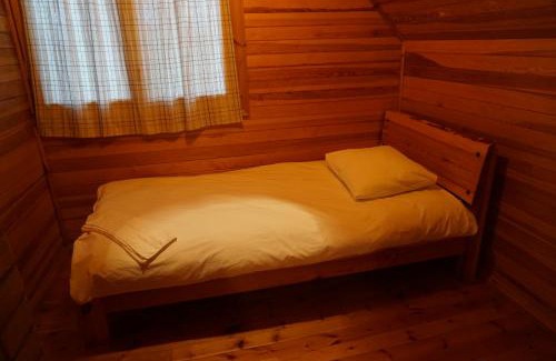 Svente Parish House | Discover Pirts Rudzupuķes: Pet Friendly with Pool & Hot Tub