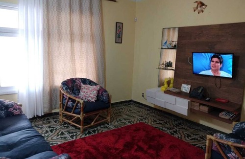 Itanhaem House | Cozy 6-Bedroom Retreat with Ocean View & BBQ Area