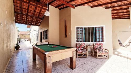 Tupy House | Relax at Our 4-Star Hotel with Heated Pool & Wi-Fi