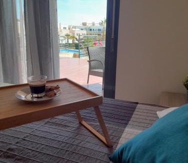 San Jorge Apartment | Relax and Work at Golf Panoramica: 4-Star Getaway!