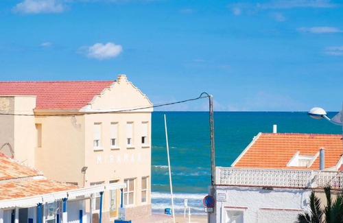 El Moncayo Apartment | Beachfront Bliss at PISO-DEL-PLAYA - Family-Friendly Retreat