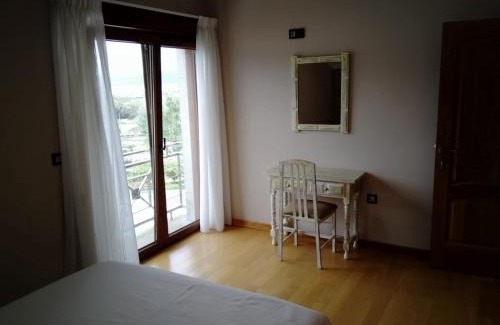 A Lanzada Apartment | Oceanfront Piso en A Lanzada with Private Beach Access