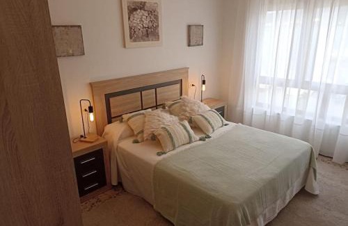 Porto do Barqueiro Apartment | Beachfront Haven: Family-Friendly Stay in O Barqueiro