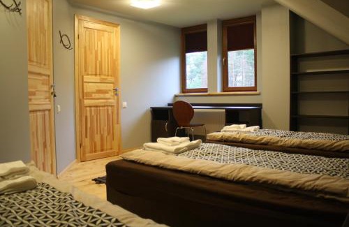 Irbene House | Relax at PIZĀ Guest House & Campsite with Ocean Views