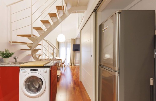 el Mercadal Apartment | Inviting Duplex Apartment near Plaça Catalunya with Spa