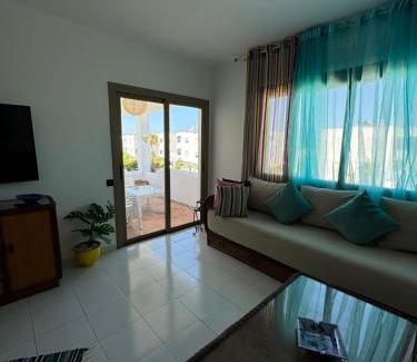 Restinga Smir Apartment | Oceanfront Escape at Plage Al Amine - Family Friendly Stay