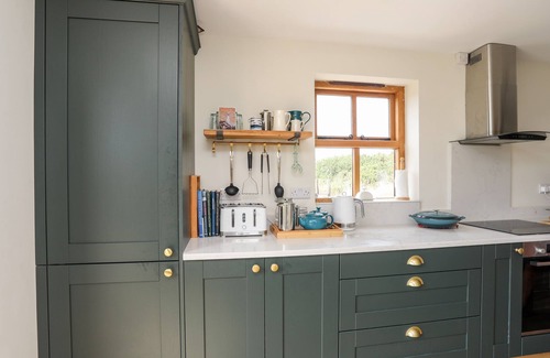 Rhoscolyn Cottage | Cozy Retreat at Plas Coch Rhoscolyn - Pet Friendly Oasis