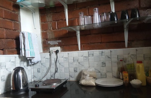 Entebbe House | Relax at the Unique Plastic Bottles House with Ocean Views