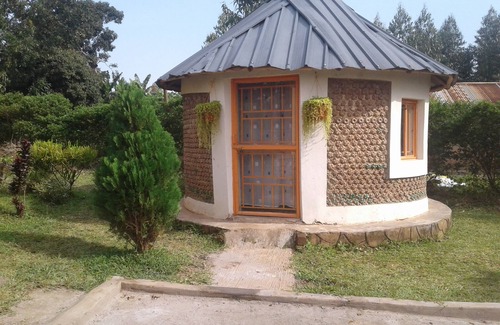 Entebbe House | Relax at the Unique Plastic Bottles House with Ocean Views