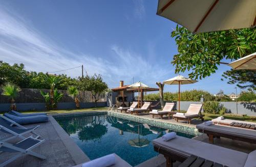 Platanes Villa | Oceanfront Retreat: Platanias Villa Spyros with Pool