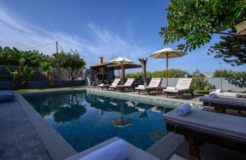 Platanes Villa | Oceanfront Retreat: Platanias Villa Spyros with Pool