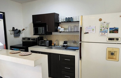 Esterillos Este House | Beachfront Playa Bejuco: Perfect Family Getaway with Spa