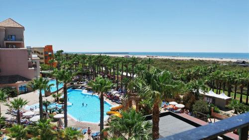 Punta del Moral Apartment | Family-Friendly Playa Canela I with Pool & High Ratings