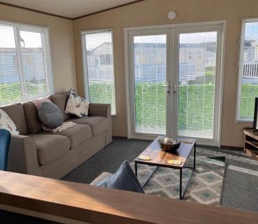 Lossiemouth Resort | Discover Playa la Casa: Oceanfront Oasis with Pool Access