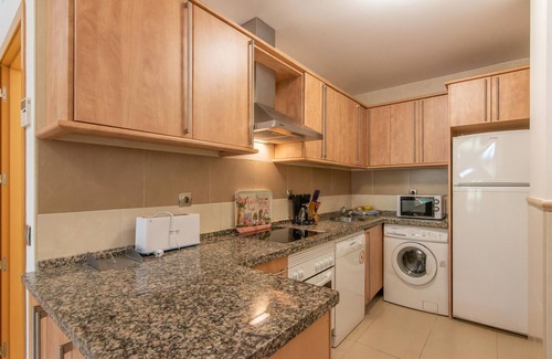 Punta del Moral Apartment | Discover Playa Marina - Ocean View with Spa and Pool