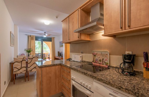 Punta del Moral Apartment | Discover Playa Marina - Ocean View with Spa and Pool