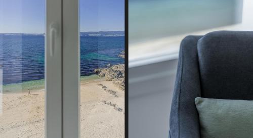 Bueu Apartment | Discover Playa Petís: Oceanfront Escape with Perfect Rating