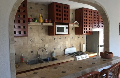 Puerto Morelos Condo | Beachfront PlayaSol Condo with Pool & Steps to the Sand