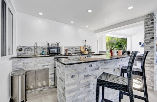Miami Gardens Villa | Family-Friendly Playhouse with Heated Pool, Gym & Spa