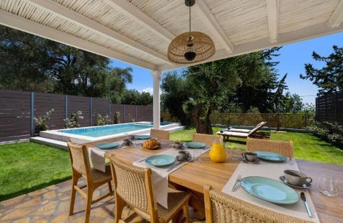 Petriti Apartment | Explore Playia Villas I: 4-Star Stay with Pool & Kitchen