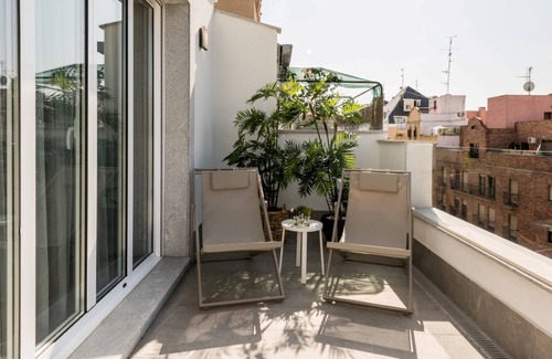 Moncloa - Arguelles Apartment | Experience the Plaza de España Skyline with Spa & Breakfast