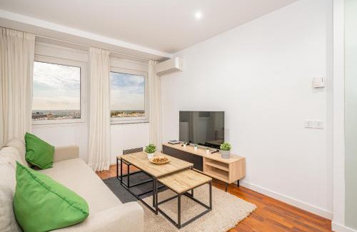 Moncloa - Arguelles Apartment | Plaza España: Breathtaking Views with Spa & Family Options