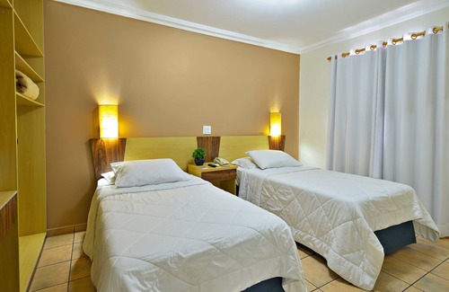 Centro Hotel | Relax at Plaza Inn Flat Araxá with Pool and Spa Amenities