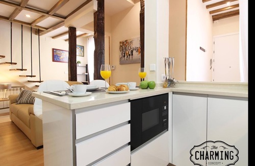 Sol Apartment | Top-Rated Plaza Mayor Duplex with Kitchen & Spa Access