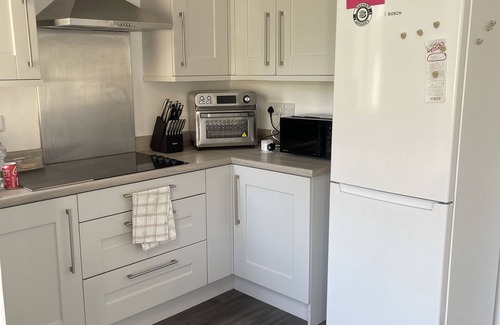 Portstewart House | Pleasant 4-bedroom house, WiFi & TV near Portrush & Portstewart.nSEA & GOLF VIEW
