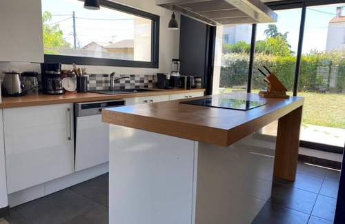 Aytre House | Bright and Spacious Entry with Family-Friendly Amenities