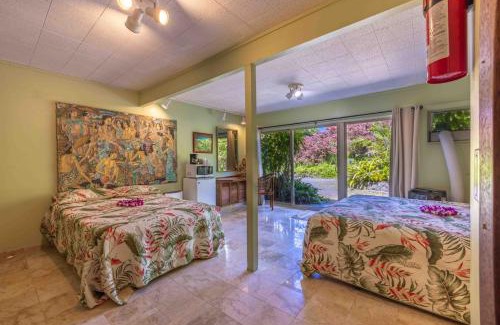 Haiku House | Serene Plumeria Room on a Lush Maui Farm Retreat