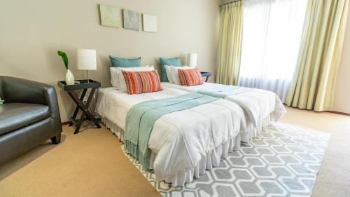 Polokwane Bed & Breakfast | Relax at Plumtree Lodge with Oceanfront Pool Access