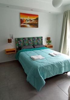Puerto Rawson Apartment | Family-Friendly Retreat at Plus Playa Unión - Rated 9.5/10