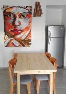 Puerto Rawson Apartment | Family-Friendly Retreat at Plus Playa Unión - Rated 9.5/10
