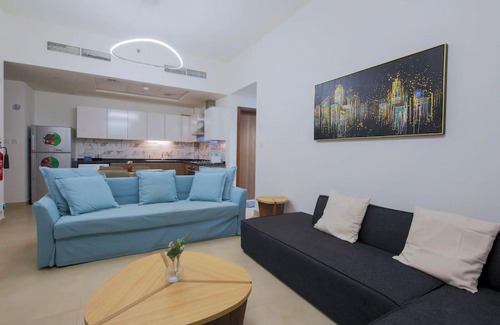 Dubai Apartment | Modern Retreat: Vibrant 1 BR Home in Furjan with Pool