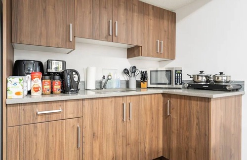 Airdrie House | Pet-Friendly Suite with Fast Wi-Fi & Great for Extended Stays