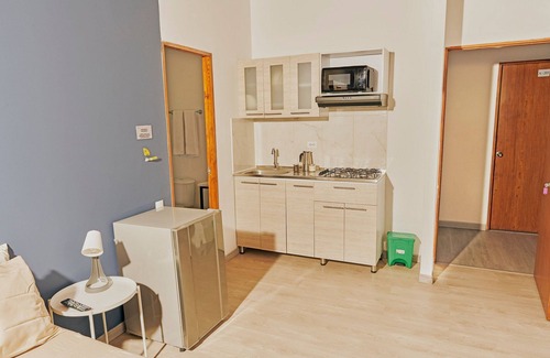 El Poblado Apartment | Relax at Poblado Aguacatala with Spa & Family Amenities