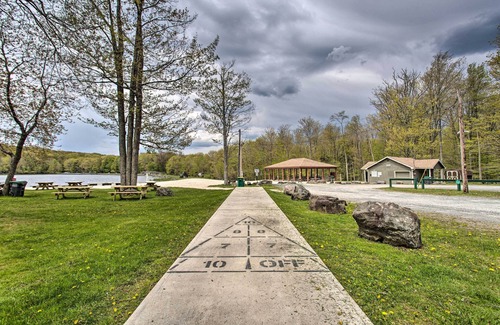 Locust Lake Village Cottage | Perfect Pocono Lake Home with Dock and Fire Pit Amenities