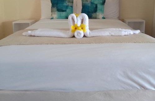 Ratho Mill Hotel | Relax at Point Bay Resort: Poolside Oceanfront Retreat