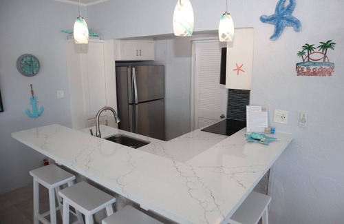 Frydendal Condo | Newly Renovated B26: Ocean Views & Poolside Relaxation